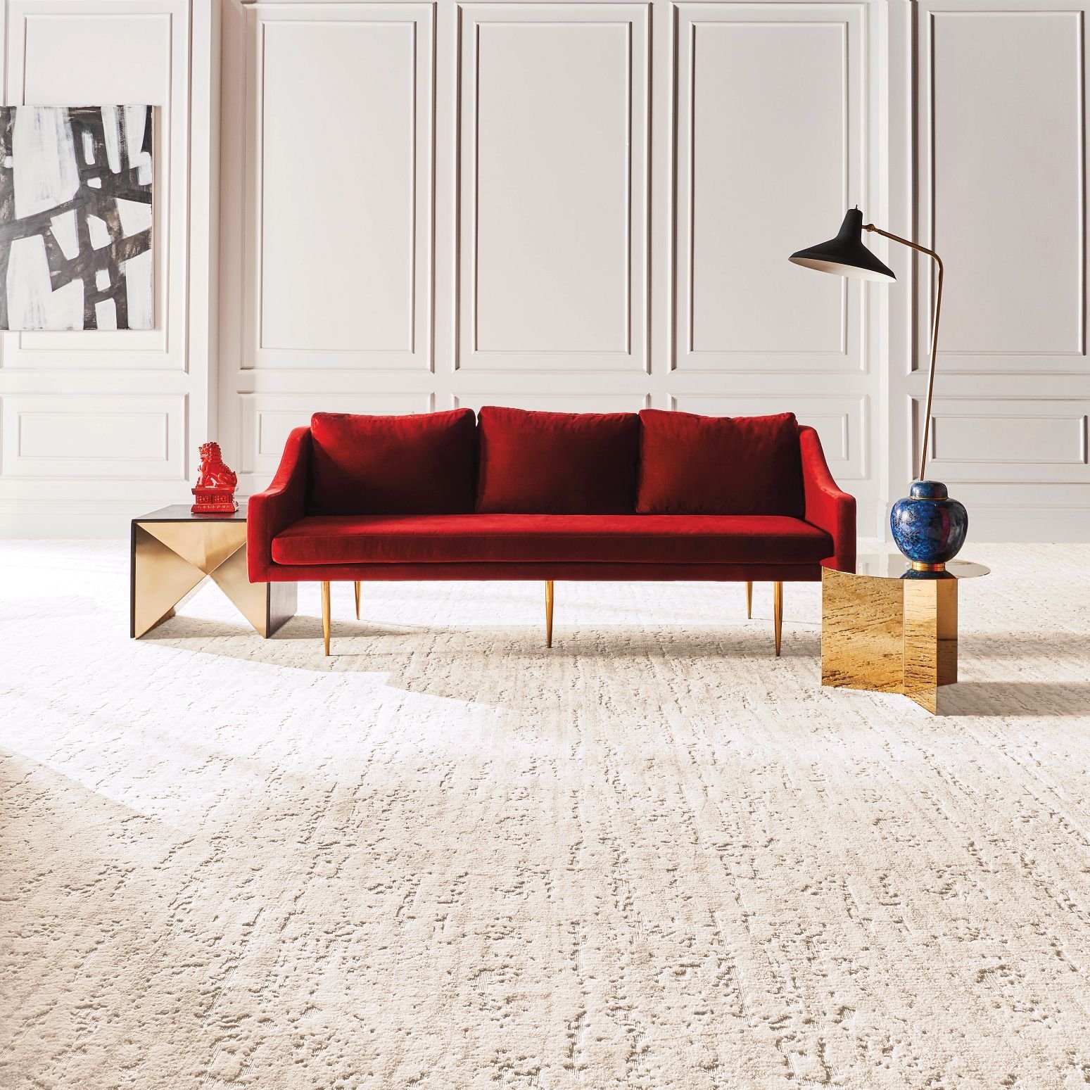 Red couch on carpet from Milford Floor Covering in Milford